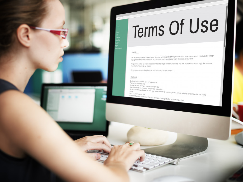 woman typing terms of use